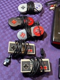 Super Retro Trio 3-in-1 Gaming console(Nes/SNES/Genesis)w Controllers and games