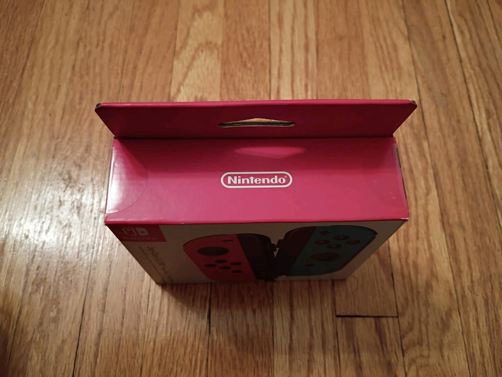 Nintendo Switch Joy Cons Neon Red (left) & Neon Blue (right)