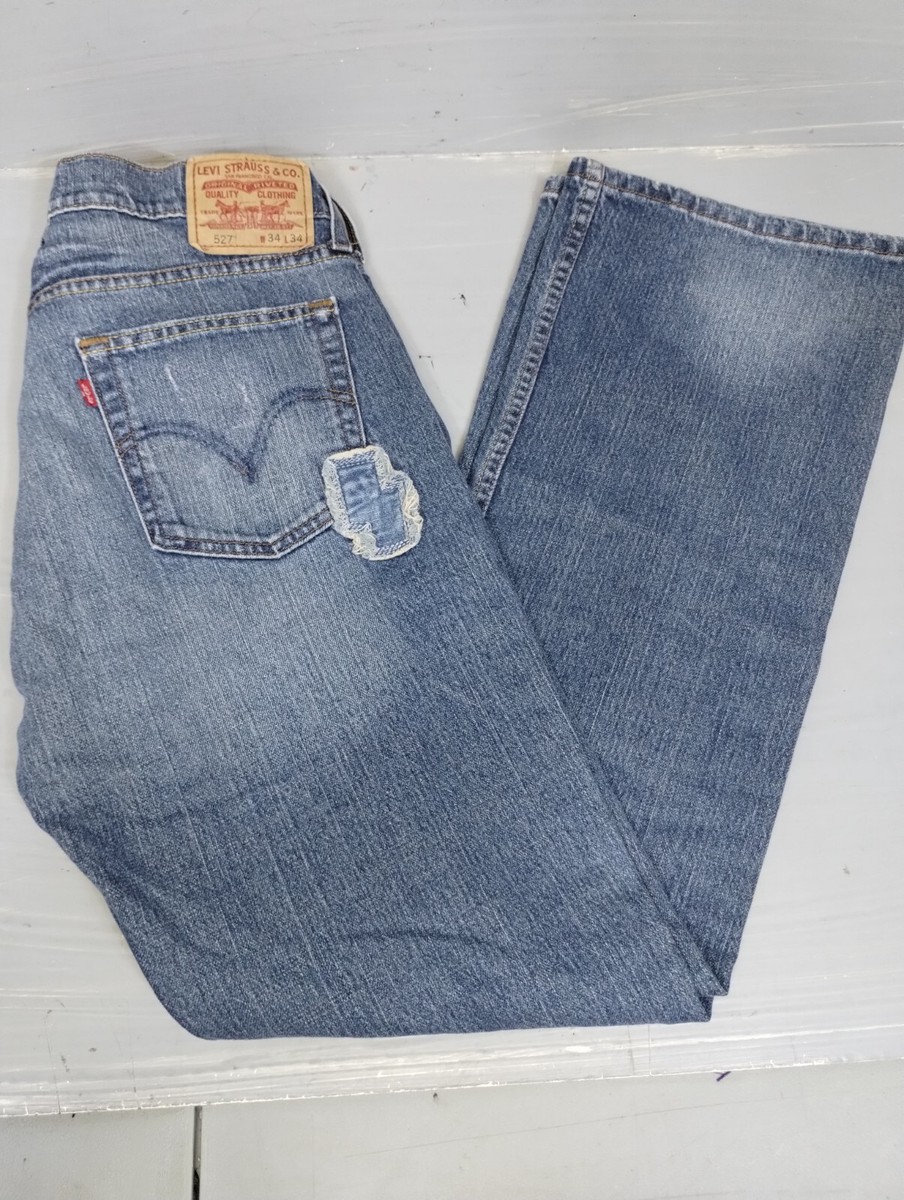 Levi's Men's 527 Low Boot Cut Blue Jeans 34x34 distressed patched
