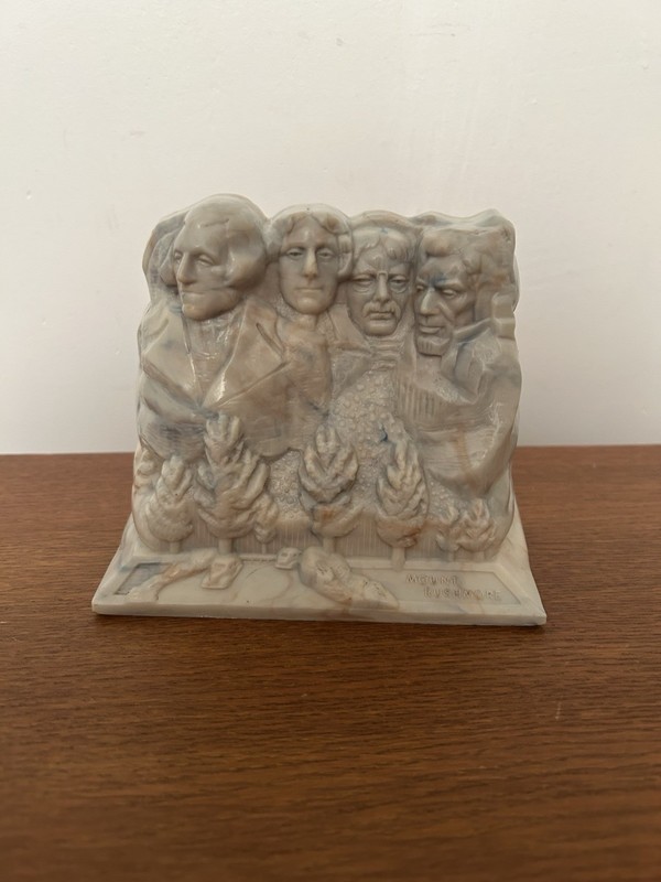 Vintage Plastic Mt. Rushmore Bank Book End Closure Turns  Information on Back