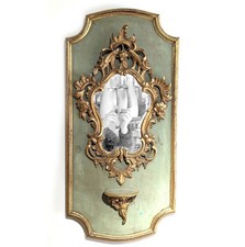 Miroir trumeau d'applique de style Louis XV laqué doré 20ème