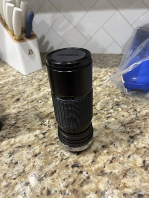 SIGMA Zoom w/Macro 1:4.5  f=100-200mm Lens With Zenith Tempest Skylight & Case