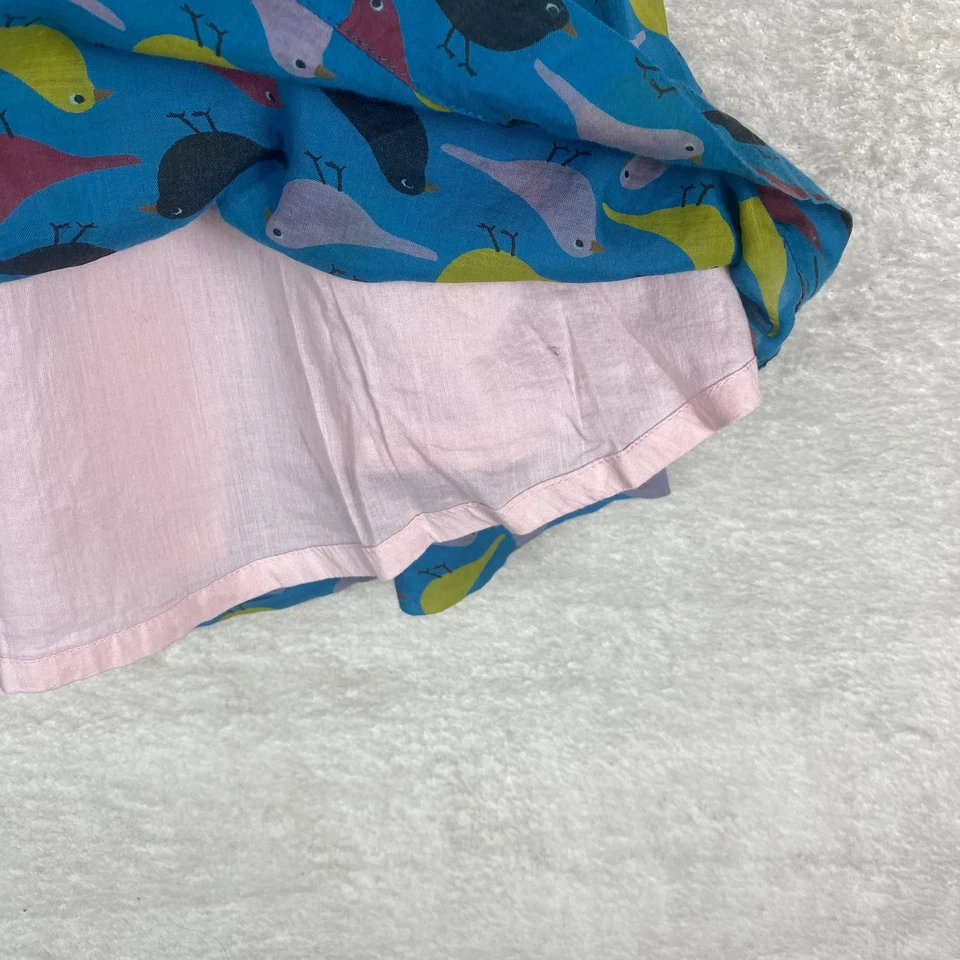 迷你紧身花卉蓝色鸽子鸟印花口袋裙衬里女孩尺寸 7-8 — 第 4/4 张图片