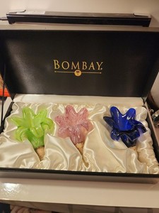 vintage Bombay brand glass bottle stoppers featuring floral designs in green,...