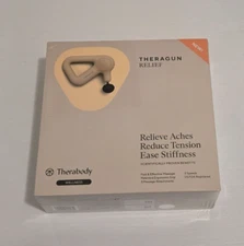 BRAND NEW: THERABODY THERAGUN RELIEF HANDHELD MASSAGE GUN TAN