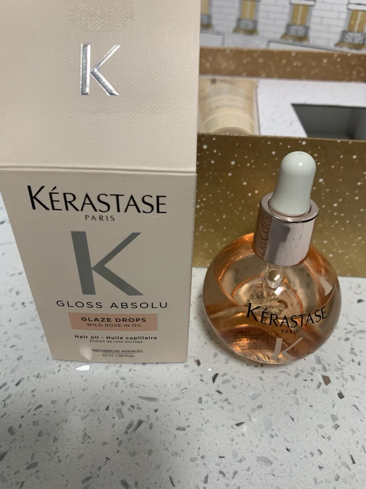 Kerastase Brillo Absolu Trio Set con Champú Acondicionador y Gotas Esmalte Foto 3 de 4
