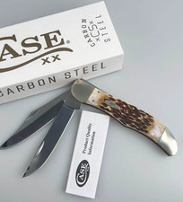New Case xx 30093 Jigged Amber Bone Carbon Stainless Steel Folding Hunter Knife