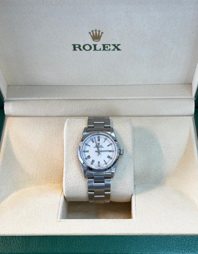 Rolex Oyster Perpetual 31mm - SS Oyster Bracelet with White Dial.