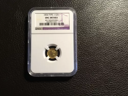 1854 gold dollar type 1 NGC Unc details reverse scratched