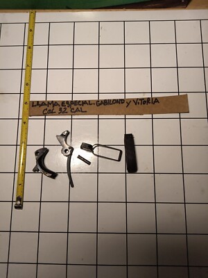 LLAMA 32 & 380 CAL Maine spring housing ,trigger, &safety O E M