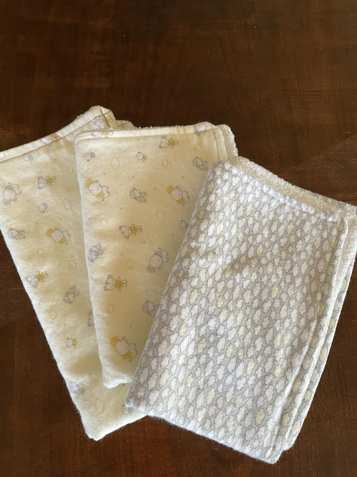 Cotton Burp clothes . Yellow print with Elephant and Teddy Bear. Gray clouds