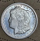 Morgan .999 SILVER 1 TROY OUNCE  BY GOLDEN STATE MINT.  Nice Golden Tone.