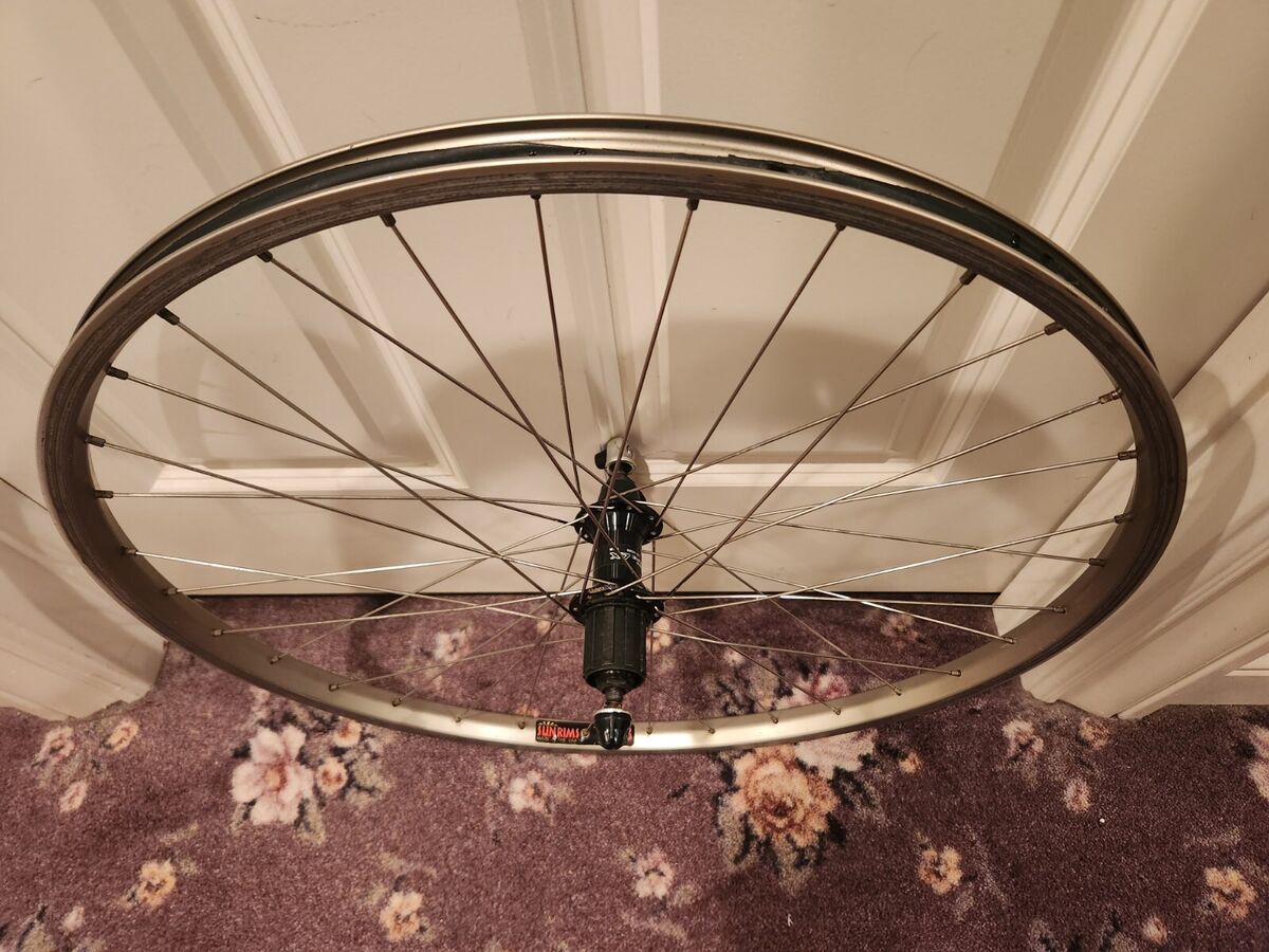 Shimano Deore LX FH-M565 REAR wheel with Sun Rims T-L18 Hoop Shimano Deore LX FH-M565 REAR wheel with Sun Rims T-L18 Hoop