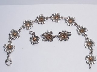 JAMES AVERY STERLING SILVER AND 18K GOLD APRIL FLOWERS BRACELET & EARRING SET.