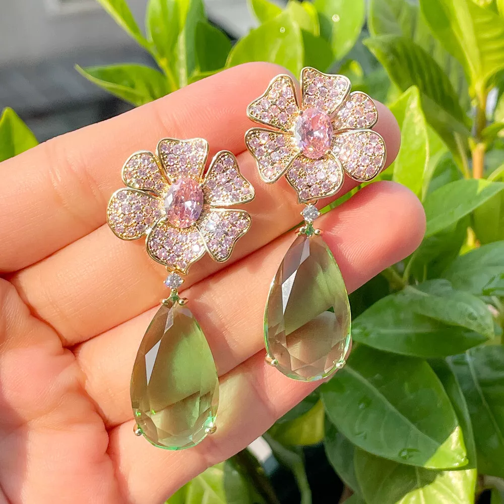 Gold flower dangle best sale earrings