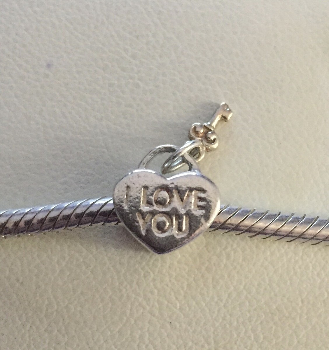 MICHAEL HILL EMMA ROE STERLING SILVER AND 10ct GOLD HEART KEY