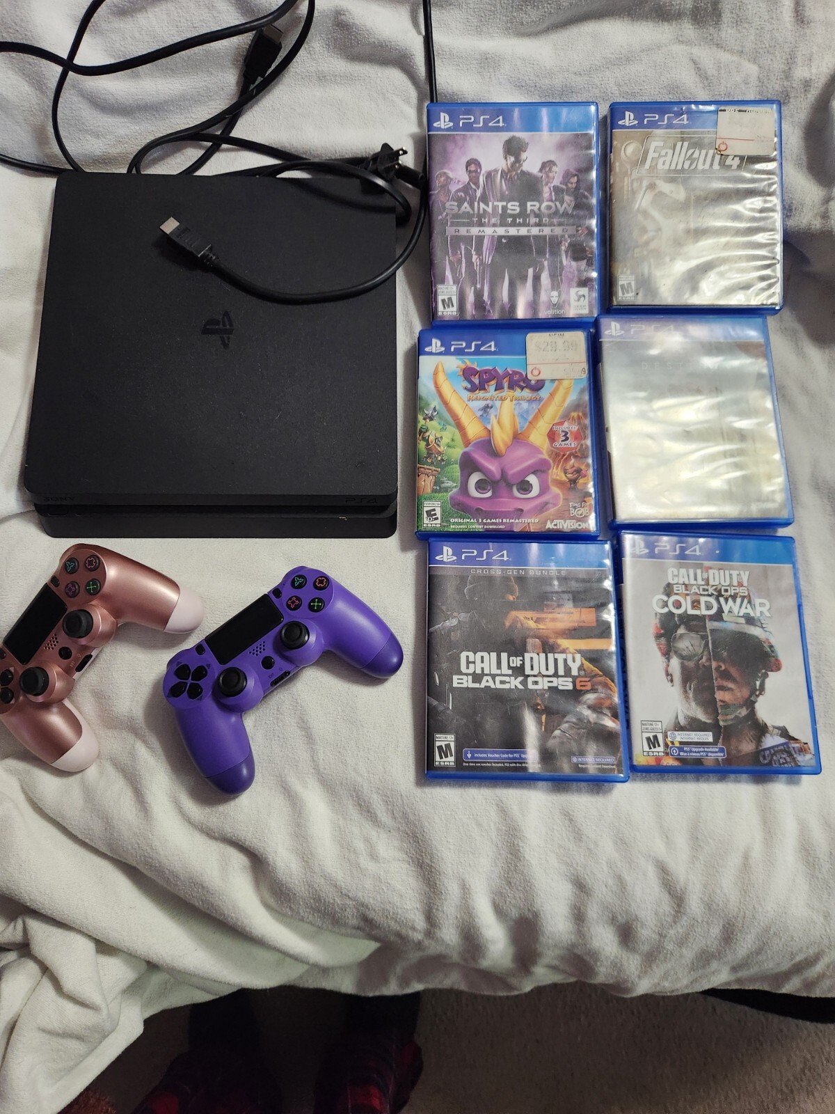 PlayStation 4 Bundle with 2 Controllers and 6 Games