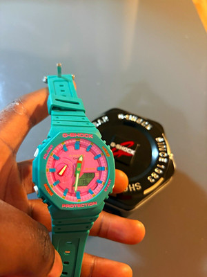 Casio G-SHOCK Shock-Resistant 200m Analog-Digital Quartz Green/Pink w/ Tin