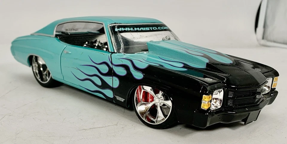 Chevrolet Chevelle 1971 fundido a presión 1/18 Maisto raro turquesa con llamas negras Foto 3 de 4