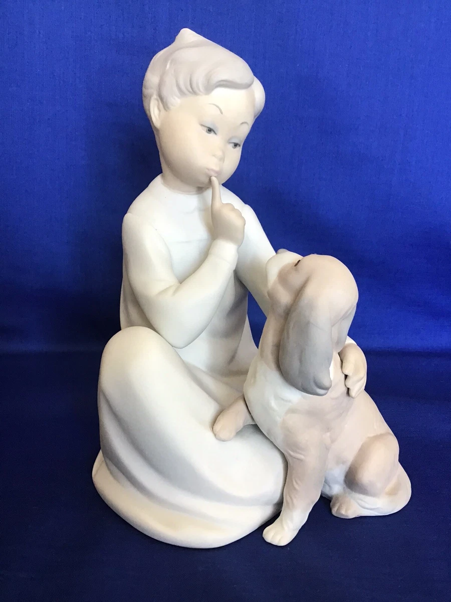 Lladro boy 2024 sitting with dog