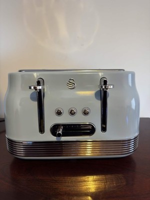 Swan Retro 4 Scheiben Toaster, 7 Bräunungsstufen 1860W, blau zwei Schlitze defekt