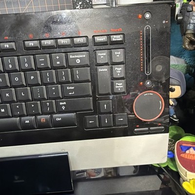 Logitech diNovo Edge Wireless Bluetooth Keyboard Charging Base Box Tested Power