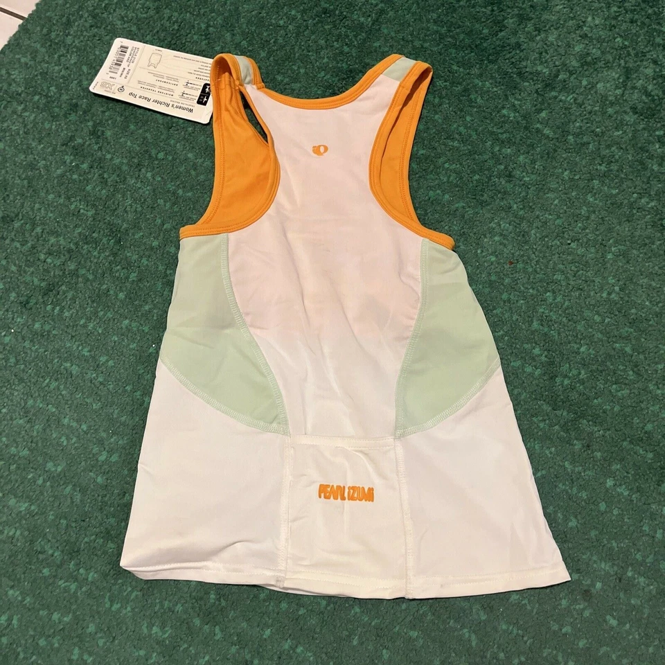 Top Richter Race Pearl Izumi para mujer blanco naranja talla X-pequeña Foto 2 de 4