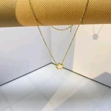 White 5 Leaf Clover Pendant On A Gold Plated Necklace