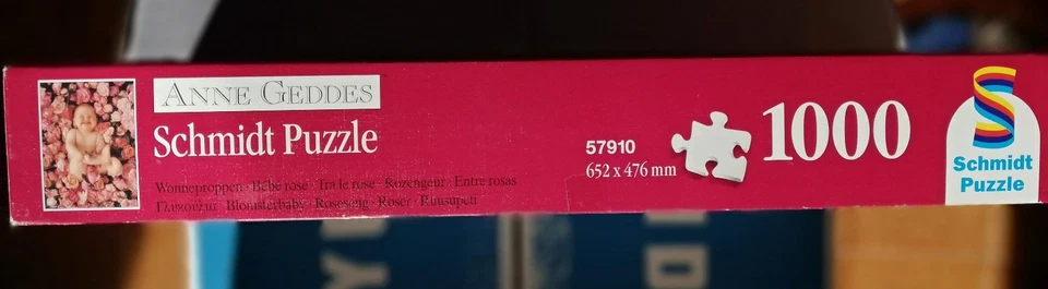 Schmidt Puzzle 1000 pezzi di Anne Geddes - Bambina tra le rose - Immagine 2 di 4
