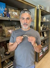 Reza Farahan gold tone mustache tie clip