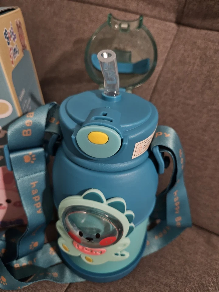 Botella de agua termo aislada al vacío para niños Foto 2 de 4