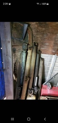 Assortment of all makes automotive driveshafts,yokes & slip joints & 4×4 shafts
