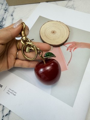 Small Resin Apple Bag Charm In Brass