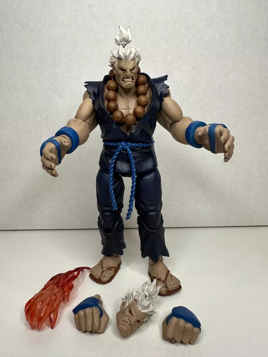 Series 4 Akuma Action Figure, Codllyne Akuma Red Hair and Blue Outfit  action figure. You might not be able to defeat Akuma in battle, but you can  own him as pa 