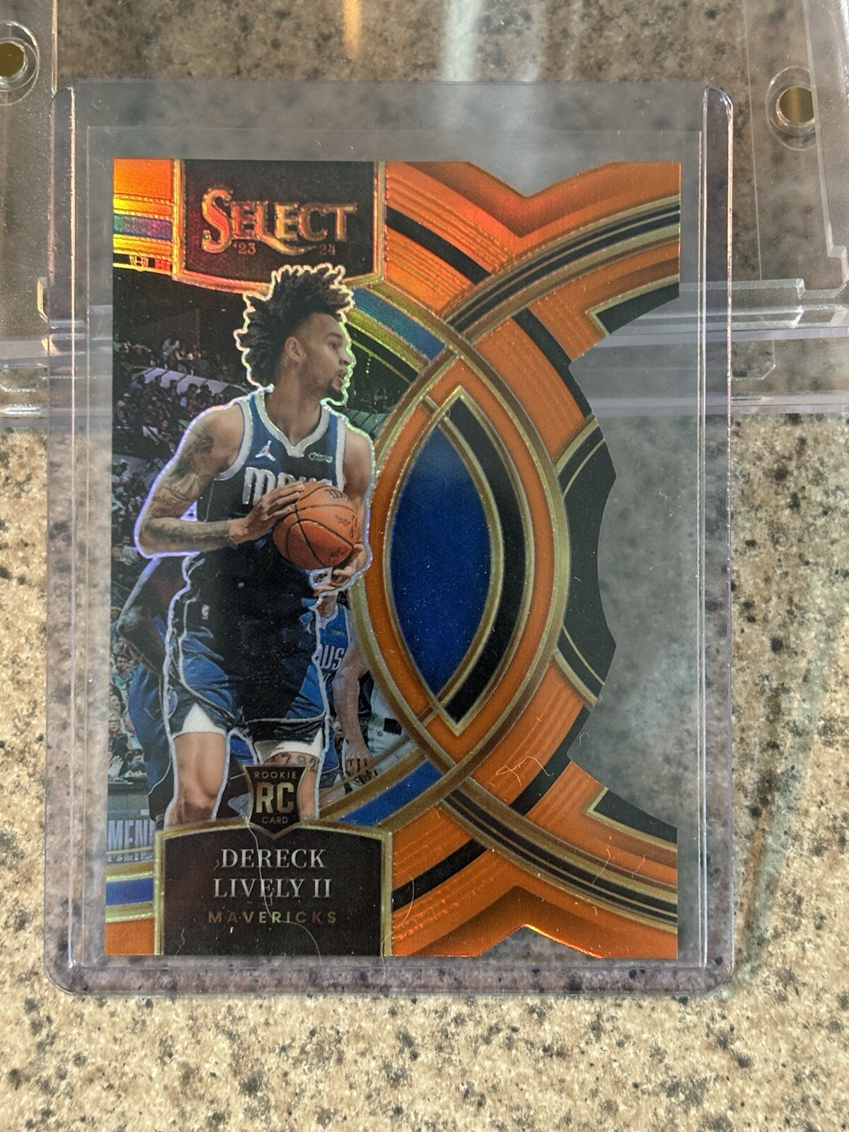 2023-24 Select - Premier Level Orange Prizm Die-Cut #111 Dereck Lively /65 (RC)