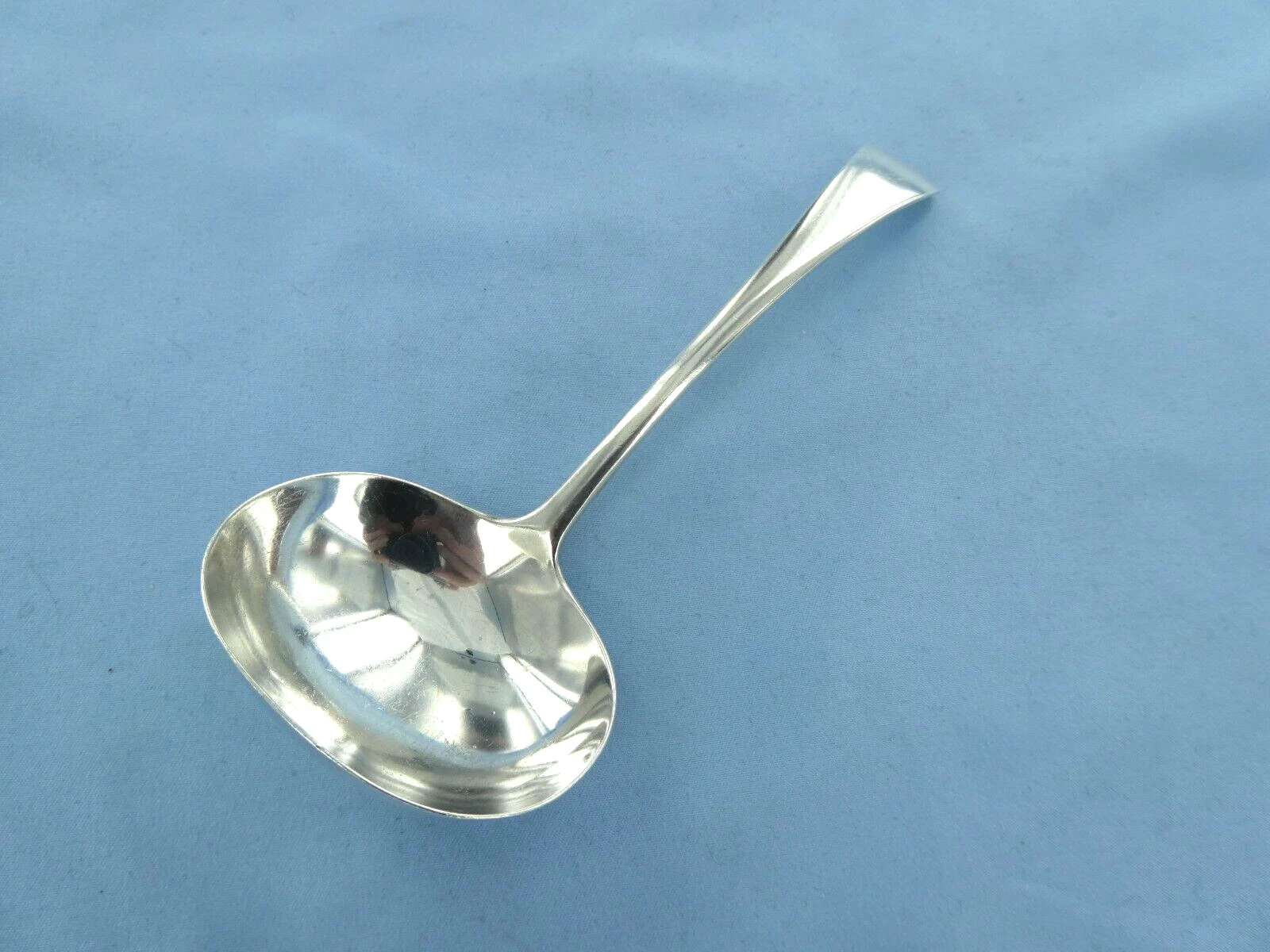 A VINTAGE STERLING SILVER OLD ENGLISH SAUCE LADLE BIRMINGHAM 1934.
