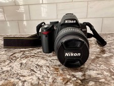 Nikon D3000 10MP DSLR Camera Kit w/18-55mm AF-S, Filter, Case, More; SC=1201