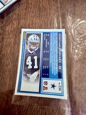 2025 Panini Donruss Optic - Rated Rookie Donovan Ezeiruaku #230 Holo Prizm (RC)