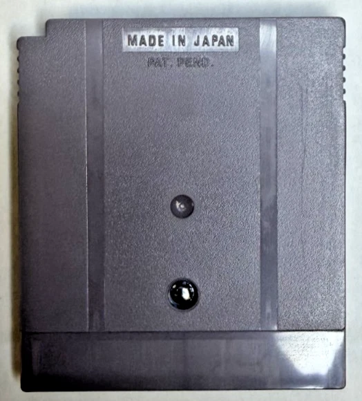 Ultra Golf para Nintendo Game Boy (1992), cartucho EE. UU. DMG-KG-EE. UU., con manual