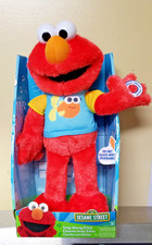 Sesame Street Sing Along Elmo Interactive Plush Toy for Kids Ages 2 and Up. New