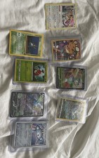 Paquete de 8 cartas Pokémon - Vaporeon TG, Zacian V, Magnezone Holo y otros