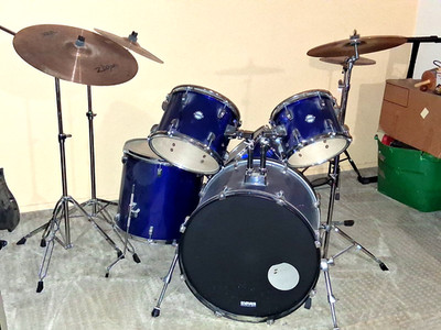 used drum set with cymbals