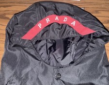 Prada Black and Red Detachable Hood with Red Logo Accent and Snap Buttons