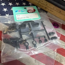 Mugen Seiki J0106 Front Upright: AVA NewInPack USA Shipped