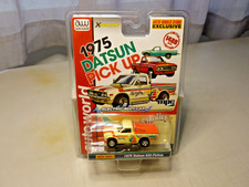 NEW AW XTRACTION 1975DATSUN 620 PICK-UP NEWTOOL LIMITED EDITION NEW IN PACKAGE.