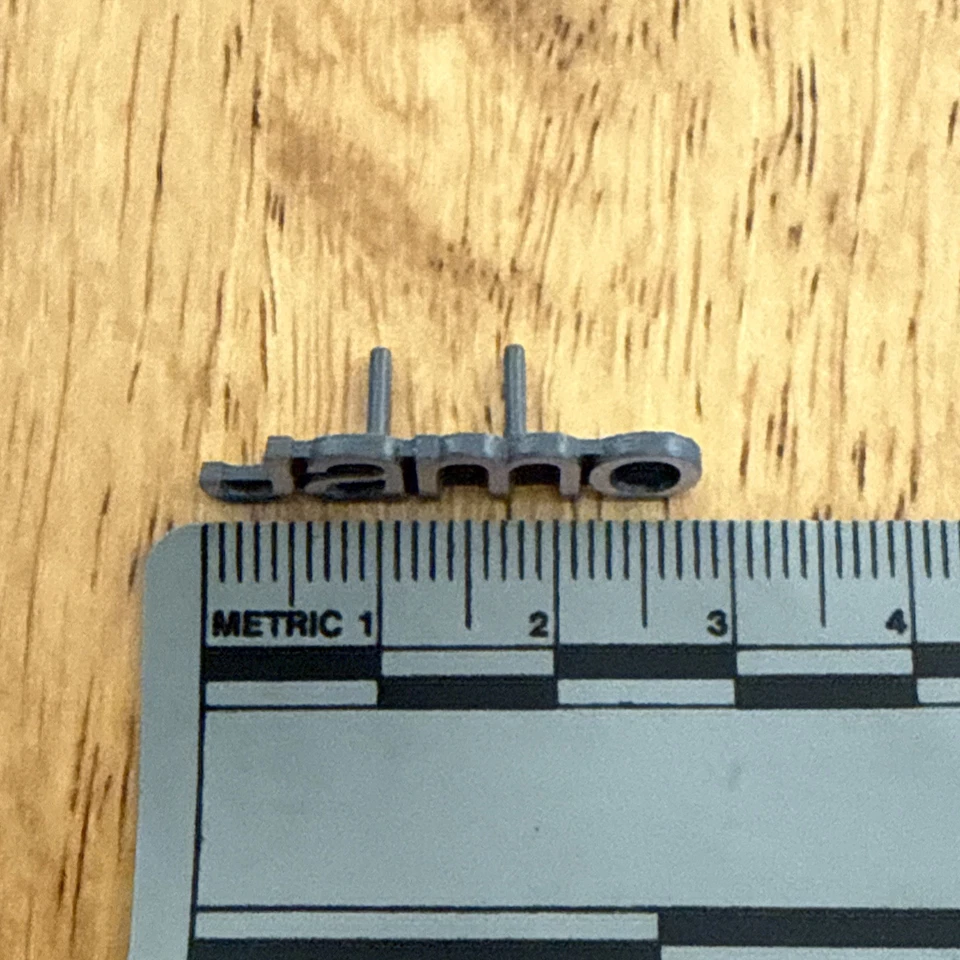 Logotipo de insignia JAMO Foto 3 de 4