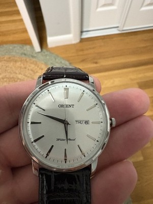 Orient Men s Dress Watch UG1R-C0-A Quartz Silver Case Day Date  Discontinued