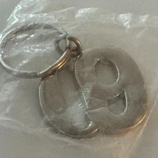 2009 09" Metal Keychain Key Ring Silver Tone