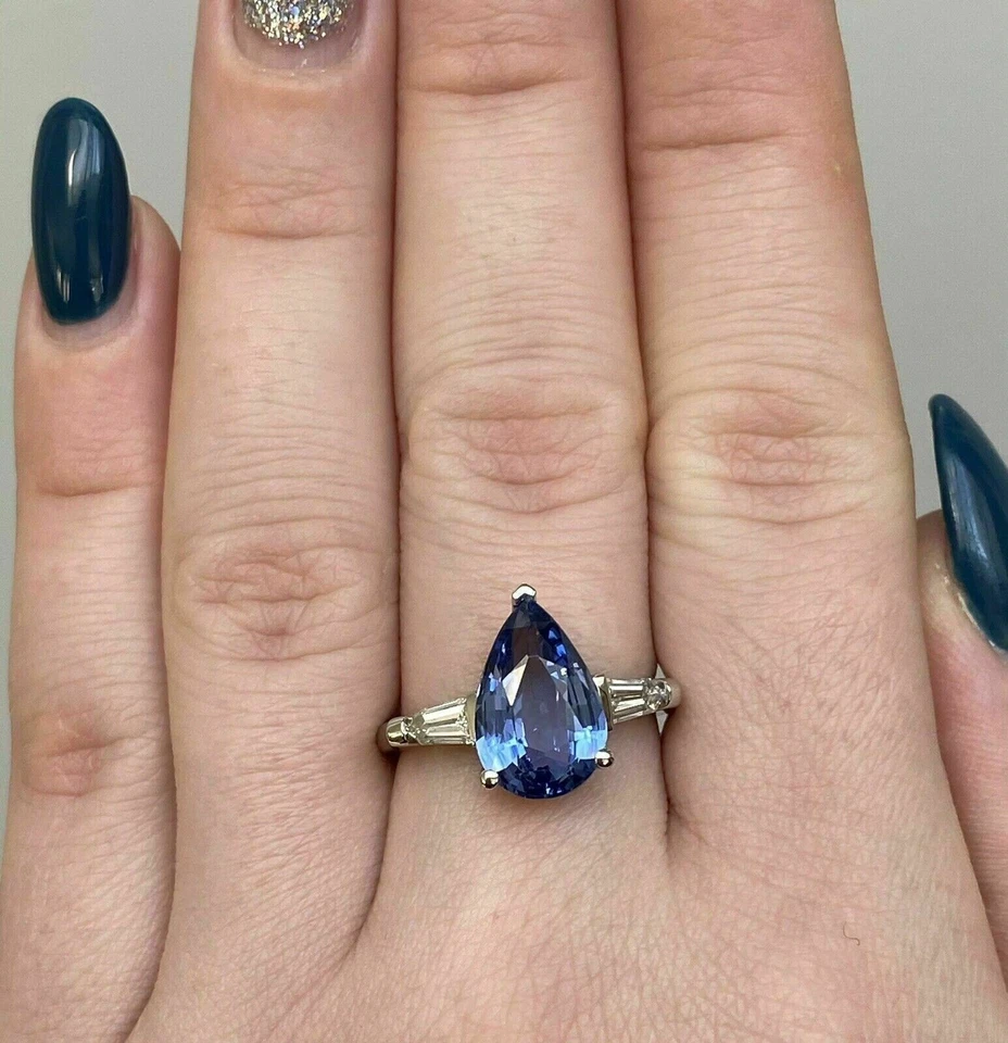 Anillo de regalo de plata 925 con acento de tanzanita y baguette creado en laboratorio corte pera de 3 quilates Foto 4 de 4