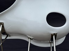 seond hand replica of a La Chaise lounge chair,